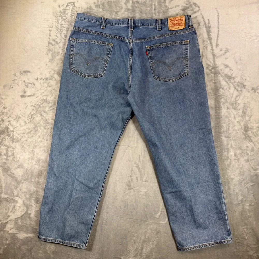 Vintage Levi's 550 Mens Relaxed Fit Jeans Men's Size 44x30 Blue Light Wash Denim